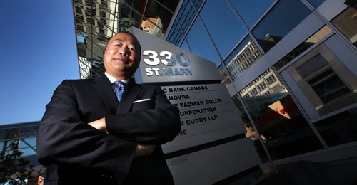 Ken Yee poses in front of 330 St Mary Ave.  his firm Cushman & Wakefield,  and TD Securities recently sold the building and a neighboring one at 175 Hargreave for a total of $38.9 million. See Martin Cash Sstory. September 14, 2012 - (Phil Hossack / Winnipeg Free Press)