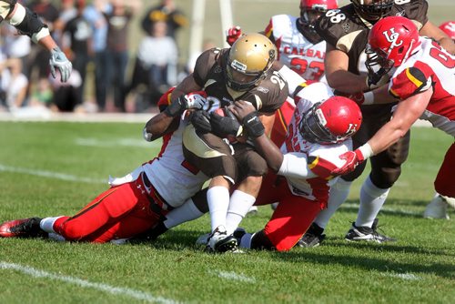 University of Manitoba Bisons Football team play against  the Calgary Dinos Saturday afternoon at the U of M field. Bisons RB #27 Kienan LeFrance gets tackled during game Saturday.  Sept 15,  2012 (Ruth Bonneville/Winnipeg Free Press)
