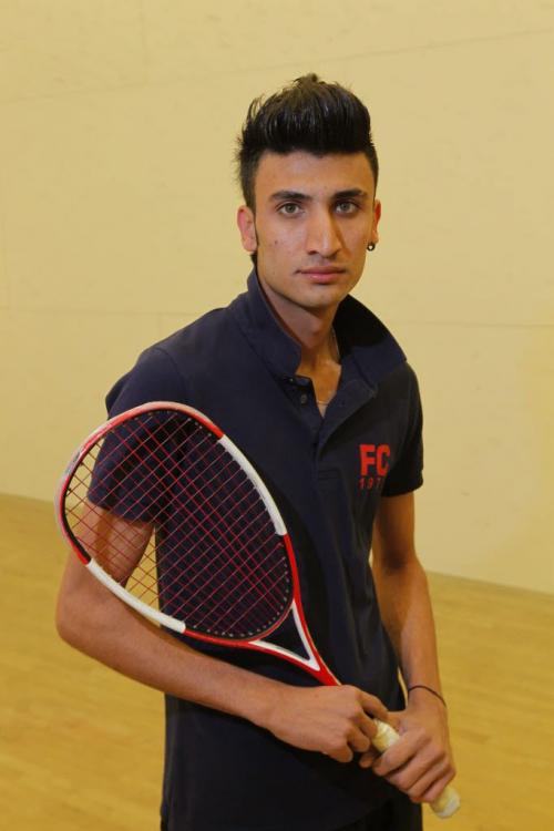 Asif Khan Khalil photographed at the U of W squash courts. Khalil works at Assiniboia Downs in the "housekeeping" duties, department. In his real life he is a squash player. September 18, 2012  BORIS MINKEVICH / WINNIPEG FREE PRESS