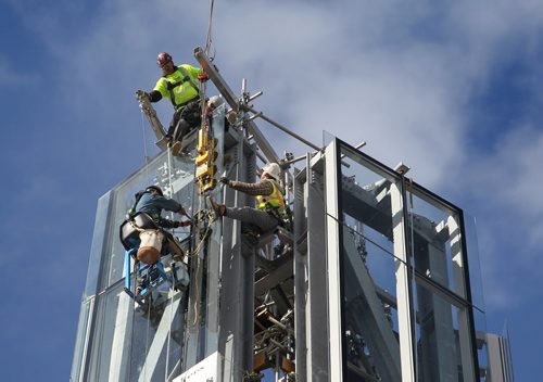 Building crews working on the Canadian Museum of Human Righs work 328 ft in the air securing the last piece of glass on teh chimney area of the Tower of Hope  Wednesday morning. See Story Sept 20,  2012 (Ruth Bonneville/Winnipeg Free Press) CMHR