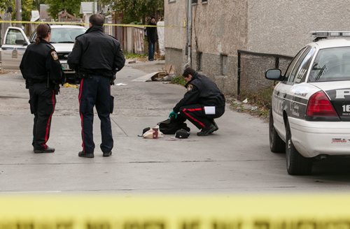 Police investigated a midday shooting on Sargent Ave between Langside St and Young St on Saturday afternoon. A man was shot in the upper body around 2 p.m. and rushed to hospital. He is now in stable condition. 120922 - Saturday, September 22, 2012 -  Melissa Tait / Winnipeg Free Press
