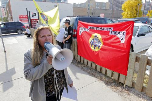 Flood victims protest at 365 Hargrave Street near the Indian Affairs office. Brooke Travers with a blow horn. September 28, 2012  BORIS MINKEVICH / WINNIPEG FREE PRESS