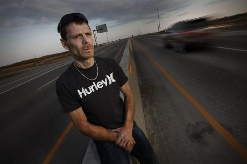 September 30, 2012 - 120930  -  Wayne Towns is photographed at the blood stained scene on the south-bound Lagimodiere south Perimeter overpass where he came across a hit and run victim early today Sunday September 30, 2012.  John Woods / Winnipeg Free Press