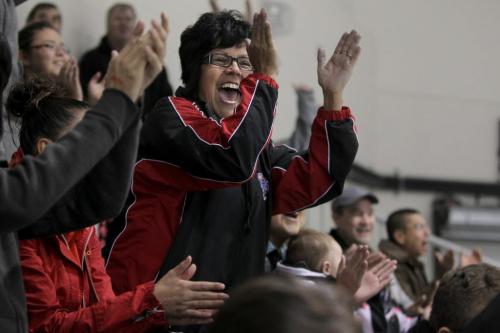 Pearl Cochrane celebrates after her son's team - the OCN Blizzards beat the Portage Terriers in a shootout during the Old Dutch MJHL Showcase Tournement at IcePlex Saturday.   See Randy Turner's  Native, Aboriginal hockey story Oct 06,  2012 (Ruth Bonneville/Winnipeg Free Press)