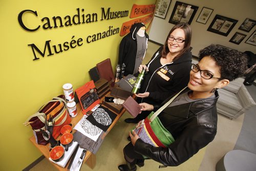 October 11, 2012 - 121011  -  Lise Pinkos (L), Education Specialist and Angela Cassie, Director of Communications and Public Engagement show off the new merchandise that will be sold by the Canadian Museum for Human Rights  photographed Thursday October 11, 2012.  John Woods / Winnipeg Free Press