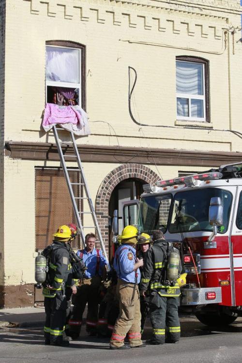October 14, 2012 - 121014  -  Firefighters attend to a fire in the 600 block of Selkirk Sunday October 14, 2012.  John Woods / Winnipeg Free Press