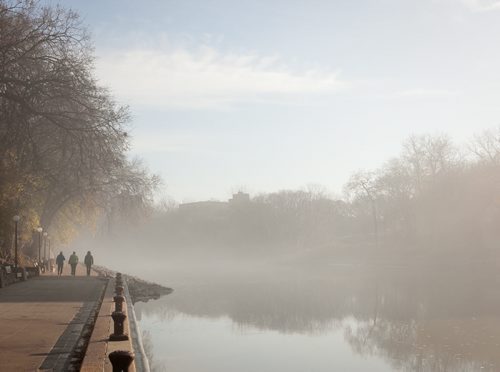 The Assiniboine River was blanketed in fog this morning which slowly lifted around 10 a.m. But not before walkers along the River Walk near the Legislative Building enjoyed a misty stroll. Melissa Tait / Winnipeg Free Press