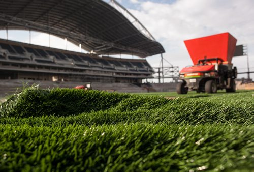 The final piece of artificial turf was laid down to create the new field for the Blue Bombers at Investors Group Field. The turf was laid down this week by the company FieldTurf and they will add 500 tonnes of rubber and sand to create the "infill" that reduces injuries on impact. Melissa Tait / Winnipeg Free Press