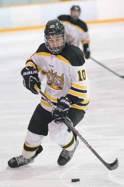 Brandon Sun 21102012 Tanner Kaspick #10 of the Brandon Midget AAA Wheat Kings moves the puck during Manitoba AAA Midget Hockey League action against the Central Plains Capitals at the Sportsplex on Sunday.(Tim Smith/Brandon Sun)