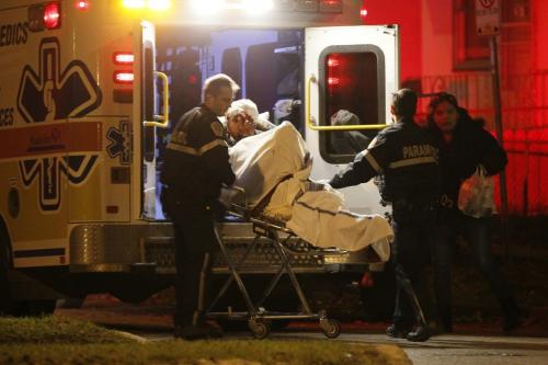 October 22, 2012 - 121022  -  Police and emergency personnel attended to a stabbing scene on Burrows at Powers Monday October 22, 2012 and removed a male patient. John Woods / Winnipeg Free Press