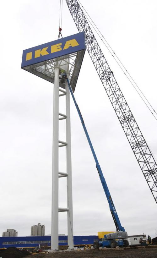 Giant IKEA sign is installed in front of the Winnipeg store on Kenaston Blvd. Wednesday. (WAYNE GLOWACKI/WINNIPEG FREE PRESS) Winnipeg Free Press  Oct.24   2012