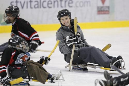 October 27, 2012 - 121027  -  Five time Olympian Hayley Wickenheiser got out on the ice today, Saturday October 27, 2012, in a means she is not used to and skated with the kids from the junior program of the Manitoba Sledge Hockey Association organized by the Society of Manitobans with Disabilities at the MTS Iceplex in Winnipeg. Wickenheiser was in town playing for the University of Calgary against the University of Manitoba Bisons. John Woods / Winnipeg Free Press