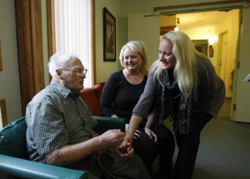 Feature on care homes featuring the Thorvaldson Care Centre on Stradbrook Ave., co-owners Karen Banfield-Thorvaldson (right) and  Jocelyn Thorvaldson with 106 year old resident William Collins. Larry Kusch story    (WAYNE GLOWACKI/WINNIPEG FREE PRESS) Winnipeg Free Press  Oct.31   2012