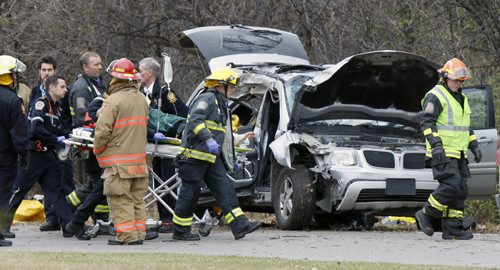 An occupant from a car that crashed on Wellington Cres. is transported to the hospital Thursday afternoon. Aldo Santin story  (WAYNE GLOWACKI/WINNIPEG FREE PRESS) Winnipeg Free Press  Nov 1    2012