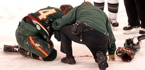 BORIS MINKEVICH / WINNIPEG FREE PRESS  070321 Aeros #34 Matt Foy bleeds on the ice after getting clocked by Moose #13 Mike Brown.