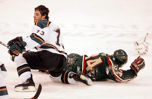 BORIS MINKEVICH / WINNIPEG FREE PRESS  070321 Moose #13 Mike Brown clocked Aeros #34 Matt Foy.