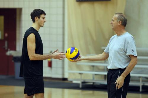 feature photo of Bisons men's volleyball coach Garth Pischke coaching his son Dane at U of M practice. November 7, 2012  BORIS MINKEVICH / WINNIPEG FREE PRESS