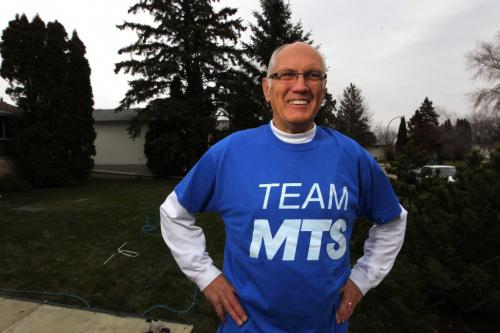 Bob McNaughton who is part of the MTS volunteer group that works with the Boys and Girls Clubs of Winnipeg and a member of the Boys and Girls Clubs of Winnipeg. Here he poses for a photo at his house. November 9, 2012  BORIS MINKEVICH / WINNIPEG FREE PRESS