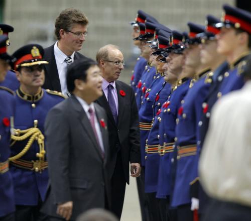 Police Grad at the Convention Centre. Various photos from the event. Andrew Swan and Sam Katz meet the grad. Lee out of focus in front.November 9, 2012  BORIS MINKEVICH / WINNIPEG FREE PRESS