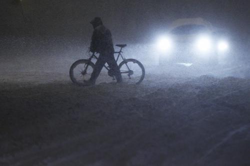 November 10, 2012 - 121110  -  A cyclist makes his way through the snow on Sargent Avenue Saturday, November 10, 2012 as they expect 10-15 cm overnight.  John Woods / Winnipeg Free Press