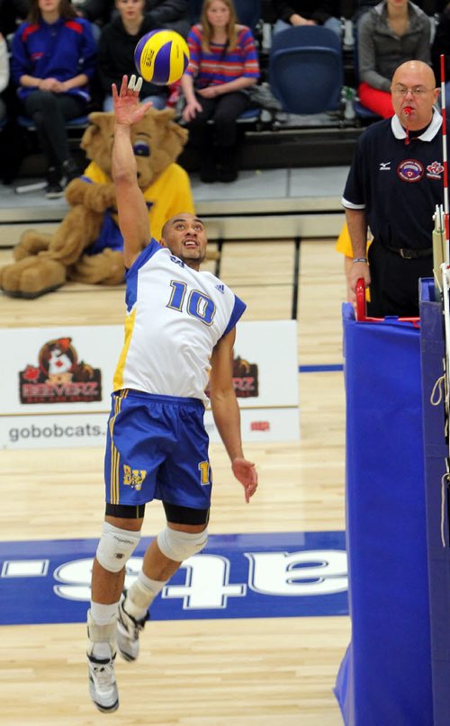 Brandon Sun 10112012 Sam Tuivai #10 of the Brandon University Bobcats leaps for a kill during university men's volleyball action against the University of Manitoba Bisons at the BU Healthy Living Centre on Saturday evening. (Tim Smith/Brandon Sun)