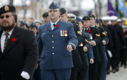 Service members march during a Remembrance Day parade from Royal Canadian Legion #7 in Transcona, to Blessed Sacrament Church, on Roanoke St. November 11, 2012. (TREVOR HAGAN/WINNIPEG FREE PRESS)