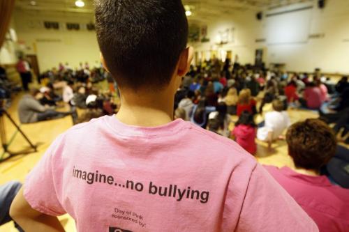 STDUP -Ayoub Moustarzak a grade 7 student  wearing anti bulling tshirt -Announcing Red Cross Day of Pink  -  2nd Annual Red Cross Day of Pink Day awarness event  started in 2007 when students became aware a classmate  was bullied for wearing a pink shirt,  In pic over 300 students of George Waters Middle School  took part in a anti bullying  assembly  and took a pledge to  fight against  and support bullied students by wearing a pink shirt .   KEN GIGLIOTTI  / WINNIPEG FREE PRESS  /  Nov 13 2012