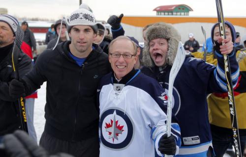 Mike Richards and Andrew Ladd had a street hockey game on the top level of the Forks parkade today at 4 p.m. Here Andrew Ladd and Mayor Sam Katz pose for a photo. The dude on the right is not ID'd. November 13, 2012  BORIS MINKEVICH / WINNIPEG FREE PRESS