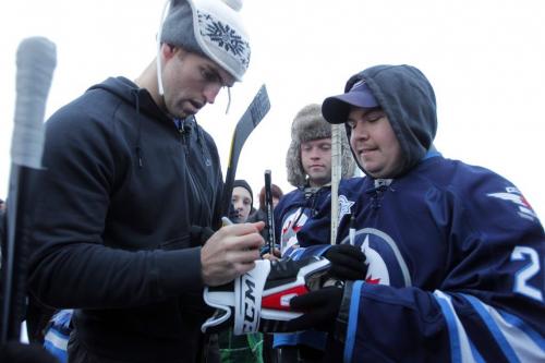 Mike Richards and Andrew Ladd(signing autographs) had a street hockey game on the top level of the Forks parkade today at 4 p.m.  November 13, 2012  BORIS MINKEVICH / WINNIPEG FREE PRESS