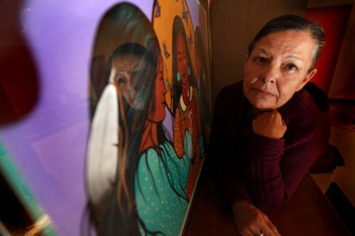 Portrait of Leslie Spillet is the executive director of Ka Ni Kanichihk, a community-based services centre. They developed a support program for families of missing and murdered women in Manitoba. Spillet sits next to a painting by Jackie Traverse depicting a event honoring missing and murdered women called "Wiping Away the Tears" See Randy Turner Story Nov 14 ,  2012 (Ruth Bonneville/Winnipeg Free Press)