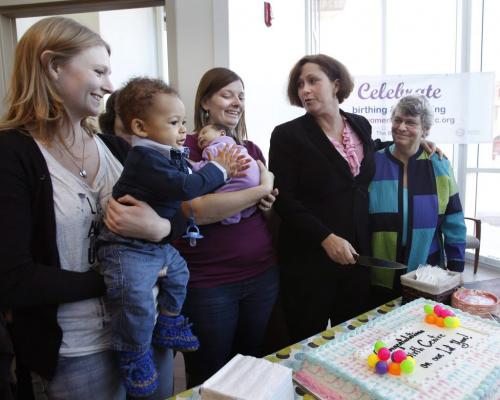 At the cake cutting ceremony Thursday for the celebration to mark the first year anniversary and the 112 mothers that have given birth at the Birth Centre from left, Sara Heinrichs holds her son Jack the first child born at the Centre, Leslie Hall with daughter Alivia the 100th baby born at the Centre, Theresa Oswald, Health Minister and Joan Dawkins, Executive Director, Womens Health Clinic.       Larry Kusch story (WAYNE GLOWACKI/WINNIPEG FREE PRESS) Winnipeg Free Press  Nov. 15    2012