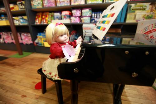 Twyla Motkaluk owner of Newbrdige Toy Shop shows off her wide arrangement of puppets, dolls and baby grand piano at her new toy shop at 1791 Main Street. See David Sanderson story for Detour section.  Nov 15 ,  2012 (Ruth Bonneville/Winnipeg Free Press)