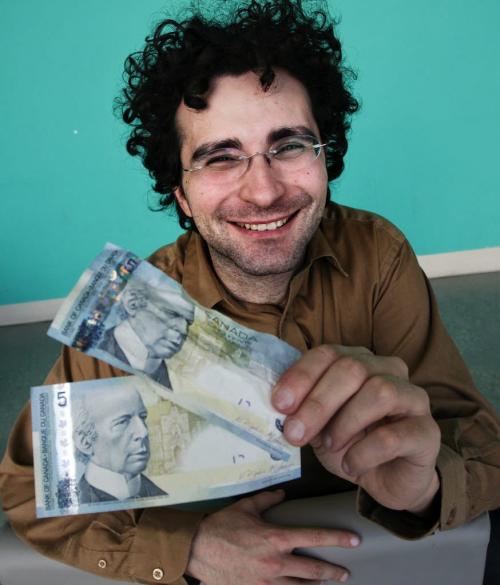 University of Winnipeg Prof. Fabrizio Di Muro has conducted research that shows people are more willing to spend old money than new money while out shopping. 121115 November 15, 2012 Mike Deal / Winnipeg Free Press
