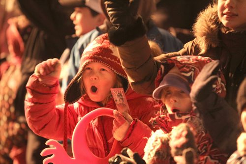 Crowds of wide eyed and excited children gather with thier famiilies  along Portage Ave. Saturday evening during the annual Santa Claus Parade. Nov 17 ,  2012 (Ruth Bonneville/Winnipeg Free Press)