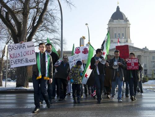 121118 Winnipeg - About 100 people gathered at the Manitoba Legislative building for a Peace March for Syria Sunday afternoon. DAVID LIPNOWSKI / WINNIPEG FREE PRESS