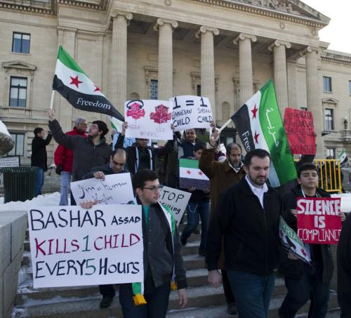 121118 Winnipeg - About 100 people gathered at the Manitoba Legislative building for a Peace March for Syria Sunday afternoon. DAVID LIPNOWSKI / WINNIPEG FREE PRESS