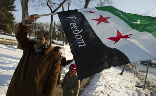 121118 Winnipeg - About 100 people gathered at the Manitoba Legislative building for a Peace March for Syria Sunday afternoon. DAVID LIPNOWSKI / WINNIPEG FREE PRESS