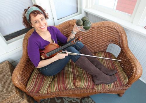 Miriam Neuman fiddle player- with her Fiddle named Laila- her favorite jeans, her rattan settee and avocados- See Carolin Vesley My Stuff column- November 16, 2012   (JOE BRYKSA / WINNIPEG FREE PRESS)
