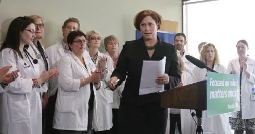 Theresa Oswald, Health Minister by a group of Cancer Care Manitoba health professionals at an announcement by Premier Greg Selinger the province will be adding 50 new health professionals and launching four regional CancerCare hubs in rural Manitoba.  Larry Kusch story. (WAYNE GLOWACKI/WINNIPEG FREE PRESS) Winnipeg Free Press  Nov. 20   2012