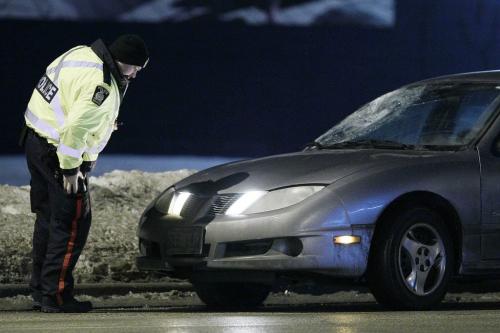 Police investigate a fatal pedestrian mvc in the northbound lanes of Pembina just north of Dalhousie Tuesday, November 20, 2012. (John Woods/Winnipeg Free Press)