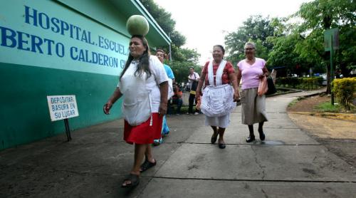 Family (some bearing gifts) arrive at Managua's Hospital Escuelda, Dr. Roberto Caulderon Gutierrez. THey provide not only moral support but food, care and everything from showers to clean sheets. Phil Hossack / Winnipeg Free Press October 25, 2012