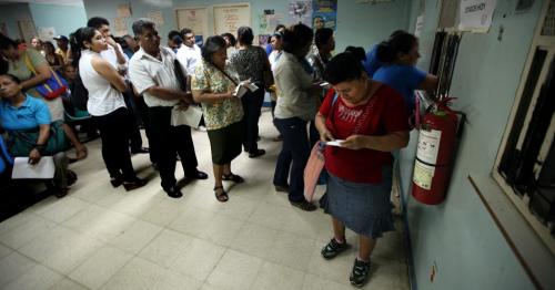 Patients line up in droves for a day clinic at Managua's Hospital Escuelda, Dr. Roberto Caulderon Gutierrez, a public teaching hospital where care is provided by the governmet. Phil Hossack / Winnipeg Free Press October 25, 2012