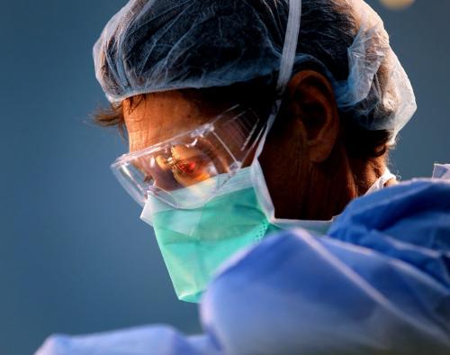 Operation Walk Surgeon David Heddon has his work reflected on a visor during knee replacement surgery in Managua. Phil Hossack / Winnipeg Free Press October 25, 2012