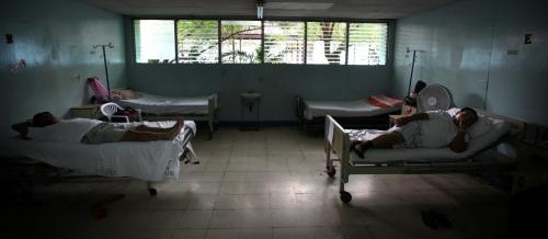 Patients wait on their beds for surgery in the men's ward in Managua. Phil Hossack / Winnipeg Free Press October 25, 2012