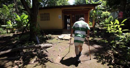Juan Canada walks toward his home on the outskirts of Managua four days after recieving bi-lateral knee replacement surgery. Phil Hossack / Winnipeg Free Press  October 25, 2012