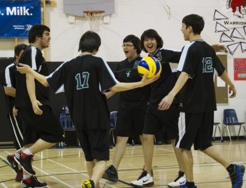 121122 Elm Creek - The Duke of Marlborough Storm (Churchill, MB) volleyball team celebrate their first point Thursday. The team made the tremendous journey from Churchill to Elm Creek, MB Thursday November 22, for the Provincial "A" volleyball Championships. The boys led by coach Tim Brock, lost both games to the Reston School Tigers in their first day of play on Thursday. Nick Martin story. DAVID LIPNOWSKI / WINNIPEG FREE PRESS