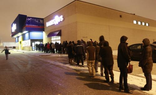 Shoppers wait for the ToysRus store to open at 7AM on St. Matthews Ave. during Black Friday shopping.  Alex Paul story (WAYNE GLOWACKI/WINNIPEG FREE PRESS) Winnipeg Free Press  Nov. 23   2012