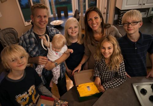 The Alby family prepared their Operation Christmas Child shoebox in October for a child in need to receive over the holidays. From left, Gavin, Ryan, Alayah, Chloe, Deborah, Hailey and Canaan. (Melissa Tait / Winnipeg Free Press)