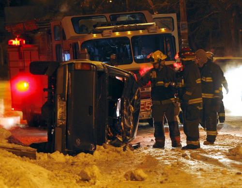 one person was injured in a single vehicle rollover that heavily damaged  a pickup truck on Westminster Ave at Walnut St at approx 6:30am .Police are investigating  KEN GIGLIOTTI  / WINNIPEG FREE PRESS  /  Nov 26 2012