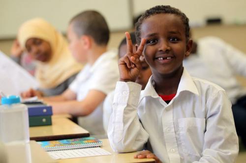 Scenes from a grae 2 class at Al Hijra Islamic School.....Mohamed flashes a toothless grin and a peace sign to a visiting photojournlist......(First names only were supplied at the request of the school) See Carol Saunders FYI story. May 22, 2012 - (Phil Hossack / Winnipeg Free Press)